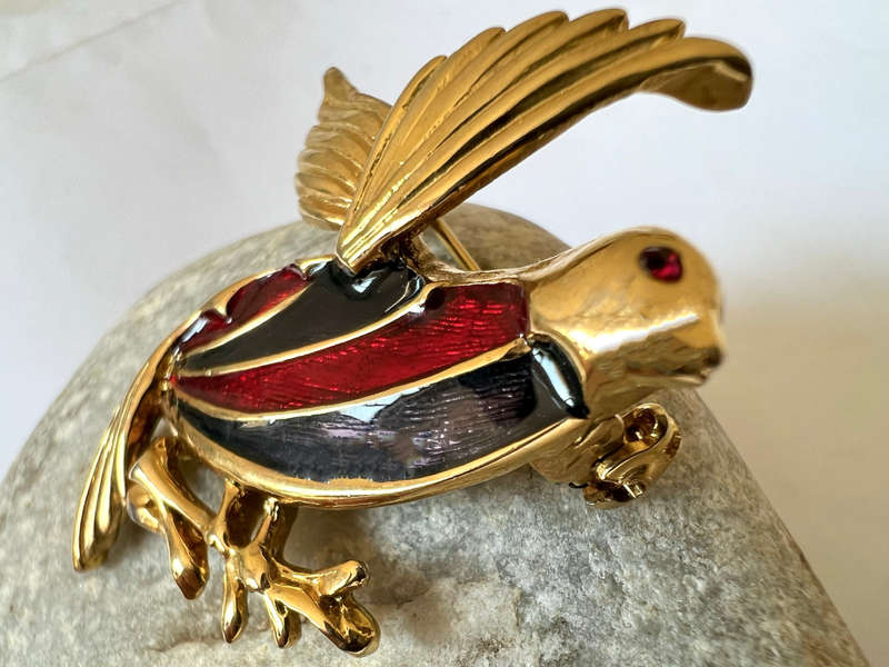 Brooch - Vintage Gold Tone Bird Design with Enamel Red and Black Wings with a Red Glass Eye ML1744