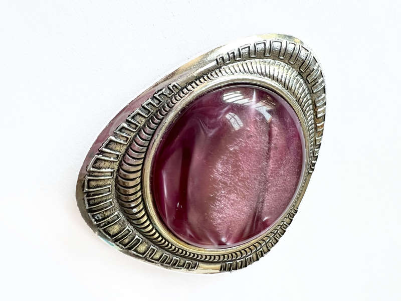 Brooch - Large Purple Plastic Stone set in Silver Tone. Curved Triangular Shape Setting ML1787