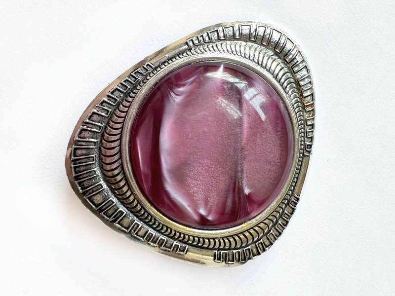 Brooch - Large Purple Plastic Stone set in Silver Tone. Curved Triangular Shape Setting ML1787