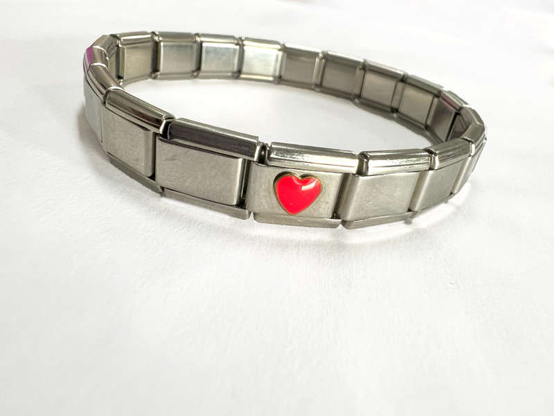 Bracelet - Stainless Steel Nomination Bracelet with one red heart Link. (20 Links in total) ML1797