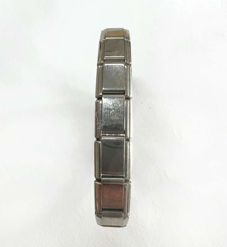 Bracelet - Stainless Steel Nomination Bracelet with one red heart Link. (20 Links in total) ML1797