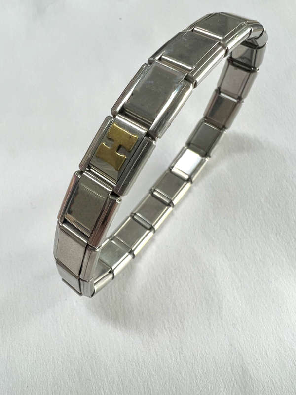Bracelet - Stainless Steel Nomination Bracelet. One Gold Coloured H Link. (20 Links in total) ML1798