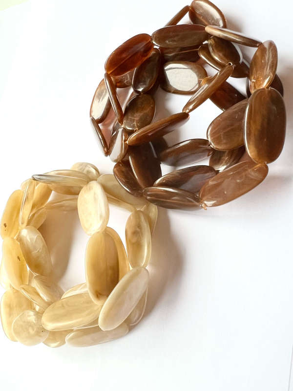Necklace - Retro Plastic Beaded Design. One Cream Oval Shaped Beads. One Brown Oval Shaped Beads ...