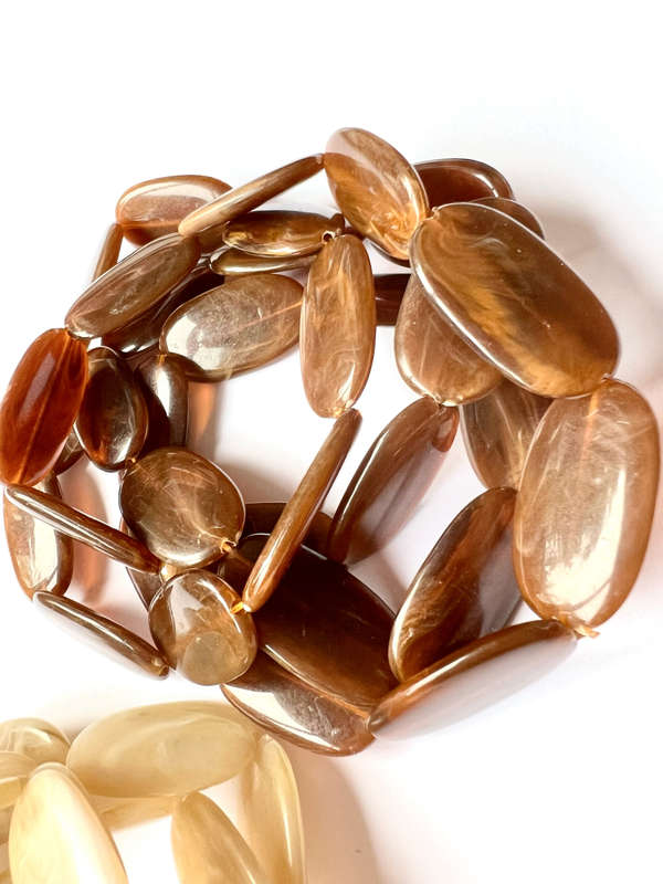 Necklace - Retro Plastic Beaded Design. One Cream Oval Shaped Beads. One Brown Oval Shaped Beads ...
