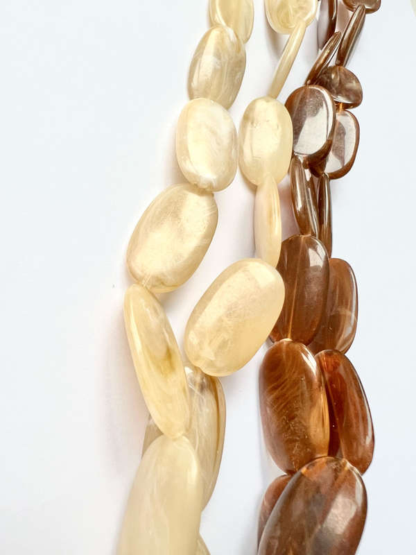 Necklace - Retro Plastic Beaded Design. One Cream Oval Shaped Beads. One Brown Oval Shaped Beads ...