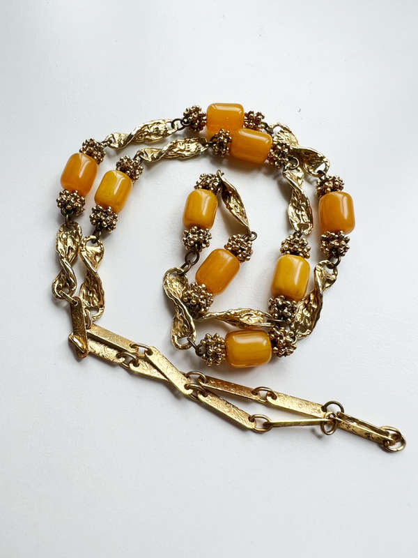 Necklace - Vintage Gold Tone, Amber Coloured Beads with Gold Tone Charms in between each Bead ML1962