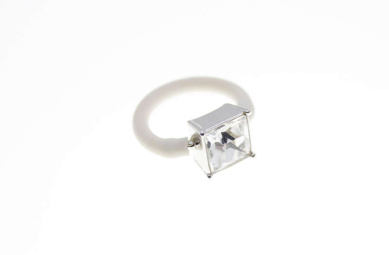 Ring - Silver Tone large Clear square Stone.  White Rubber around Band - ML2395