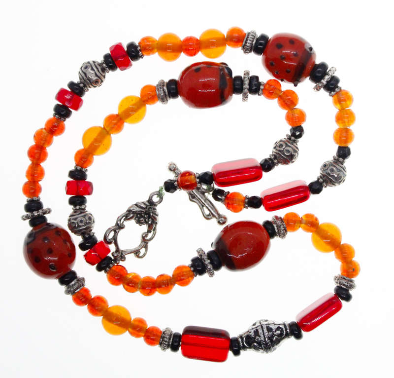Necklace - Fun Red Orange,Beaded Necklace. Silver Tone, Black Beads T Clasp - ML2572