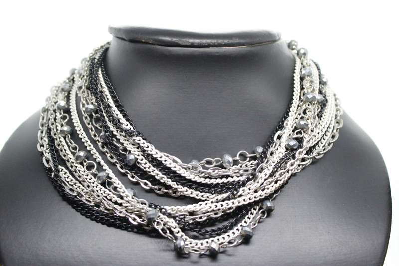Necklace - Silver Tone & Different colour metal chains. Middle Chain has silver beads on it - ML2583