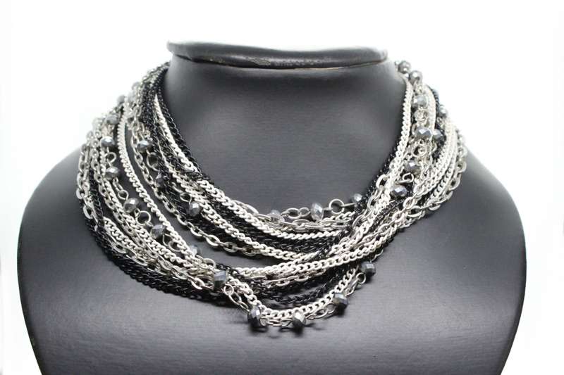 Necklace - Silver Tone & Different colour metal chains. Middle Chain has silver beads on it - ML2583