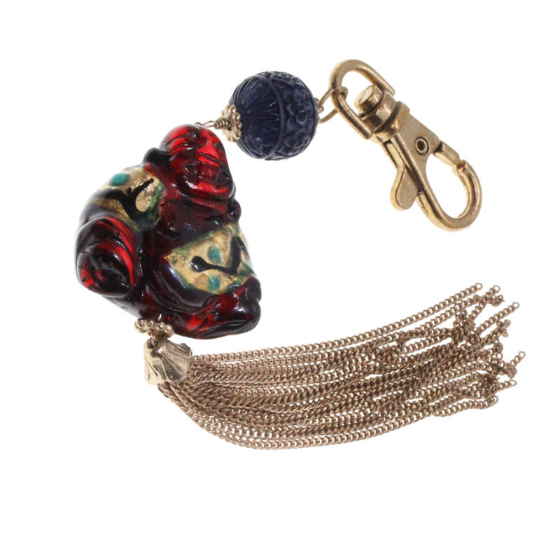 Keyring - Gold Tone. Resin Buddah with Gold Tone Tassels. - ML2688