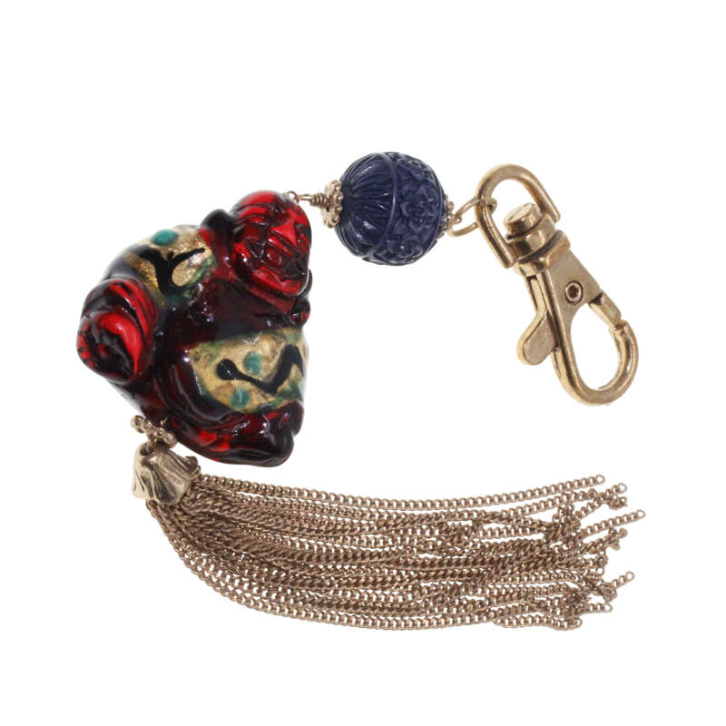 Keyring - Gold Tone. Resin Buddah with Gold Tone Tassels. - ML2688