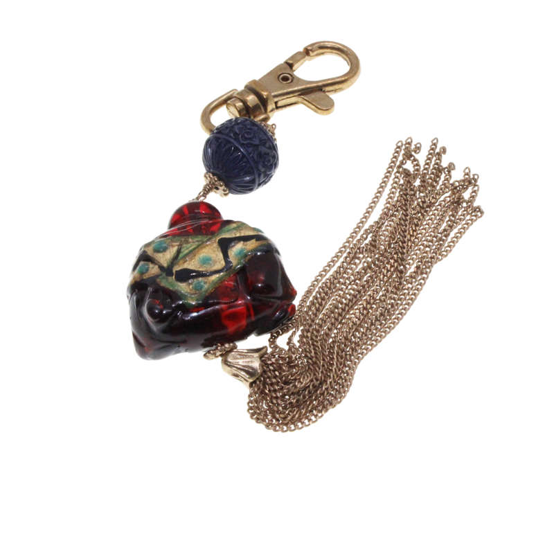 Keyring - Gold Tone. Resin Buddah with Gold Tone Tassels. - ML2688