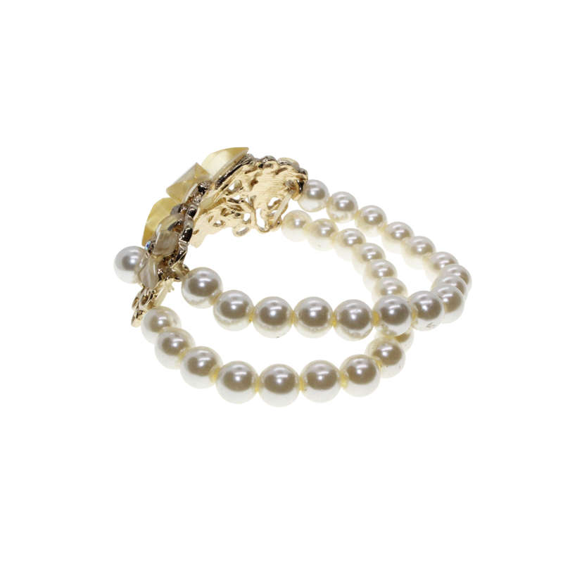 Bracelet - Gold Tone Stretch design. Beautiful Shimmering Floral Centre. Faux Pearl Stack - ML2881