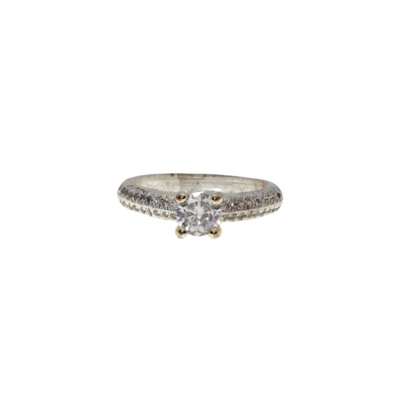Ring - Silver Tone Band. Solitaire Style Centre Stone surrounded by small Diamantes - ML2972