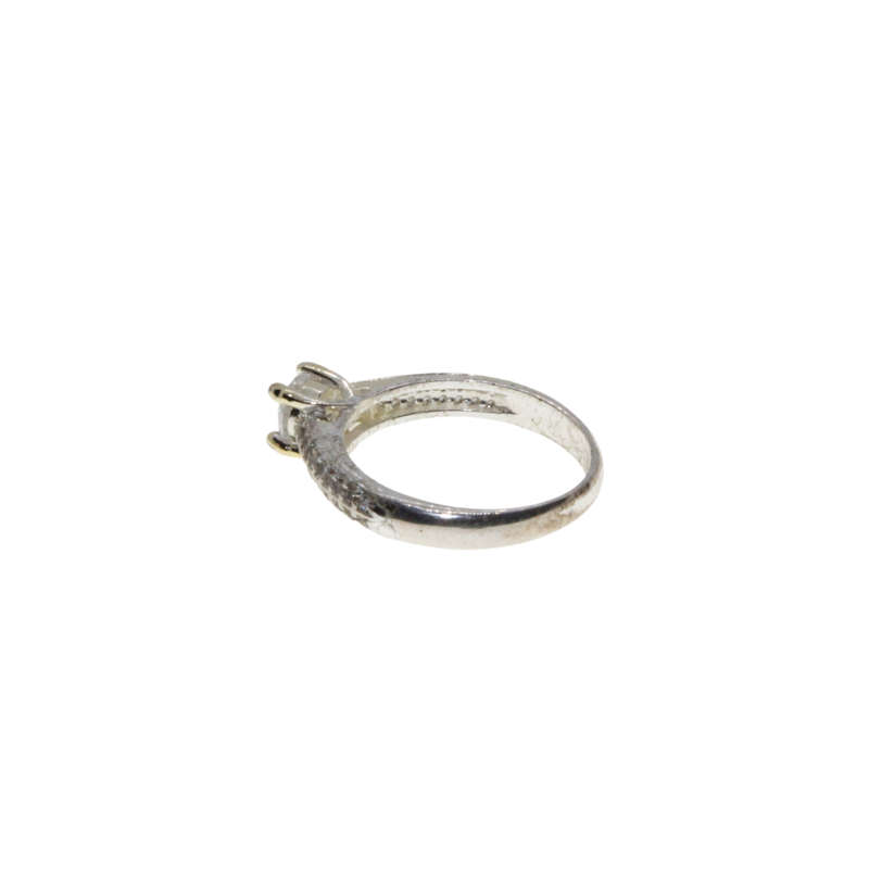 Ring - Silver Tone Band. Solitaire Style Centre Stone surrounded by small Diamantes - ML2972