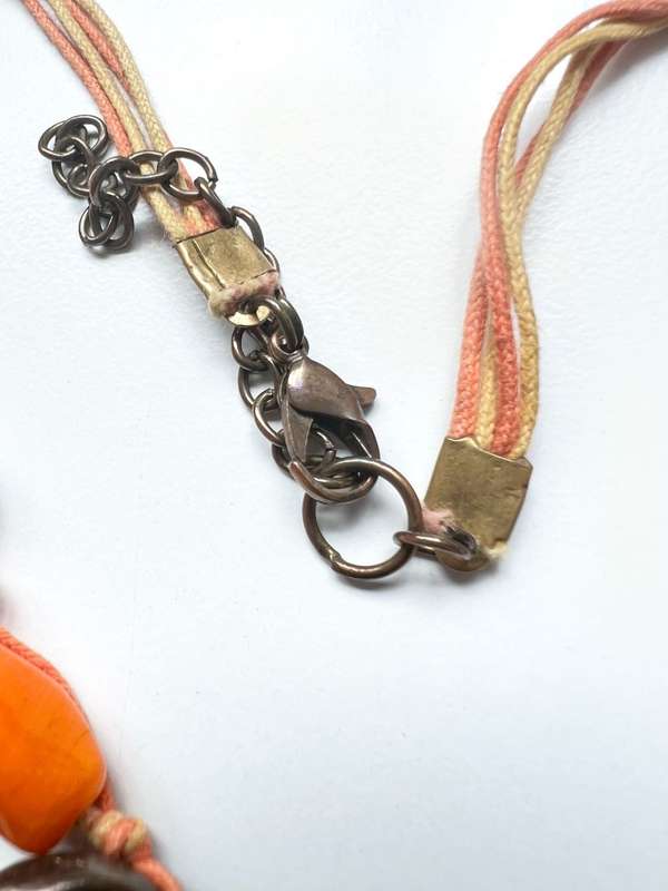 Necklace - Vintage Necklace 2 Swands. Orange Beads and Copper Tone Donut Shape Beads ML2003