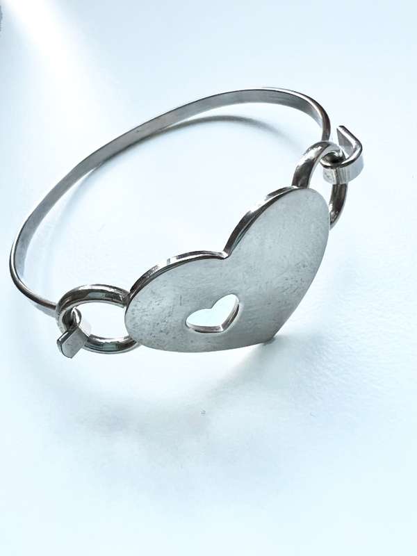 Bangle - Silver Tone Bangle with Large Heart and Small Heart Cut Out ML2023
