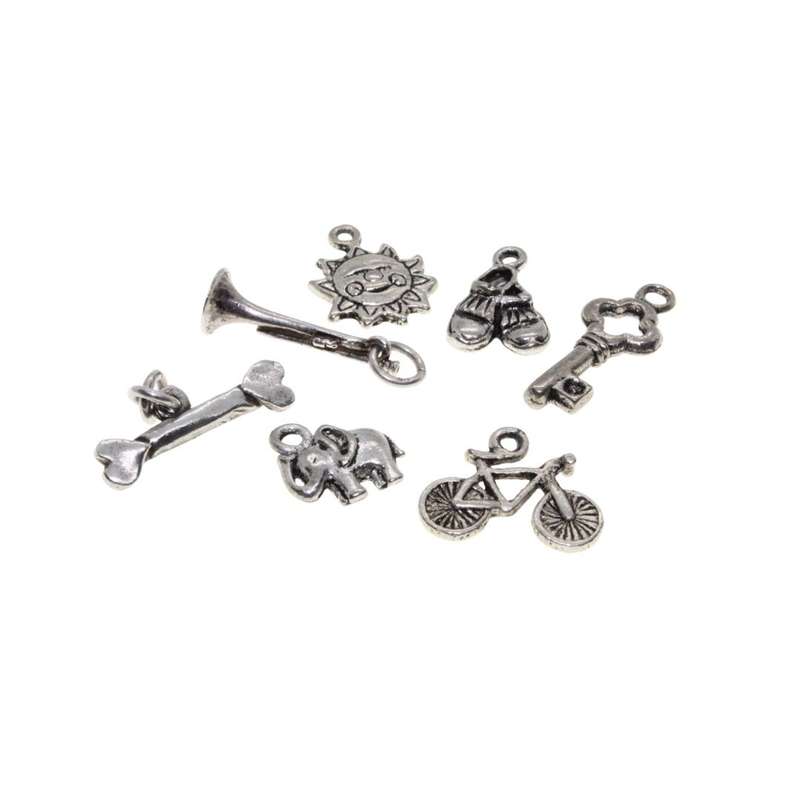 Charms - Silver Tone pack of 7 Charms. Bicycle, Elephant, Sun, Shoes, Bone, Key & Trumpet - ML3129