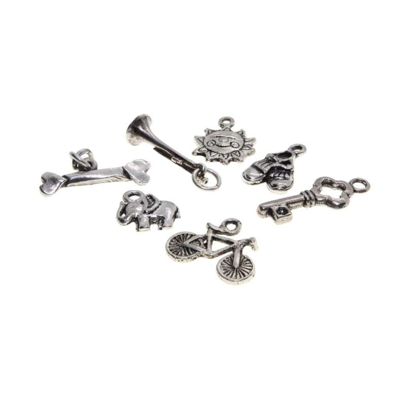 Charms - Silver Tone pack of 7 Charms. Bicycle, Elephant, Sun, Shoes, Bone, Key & Trumpet - ML3129