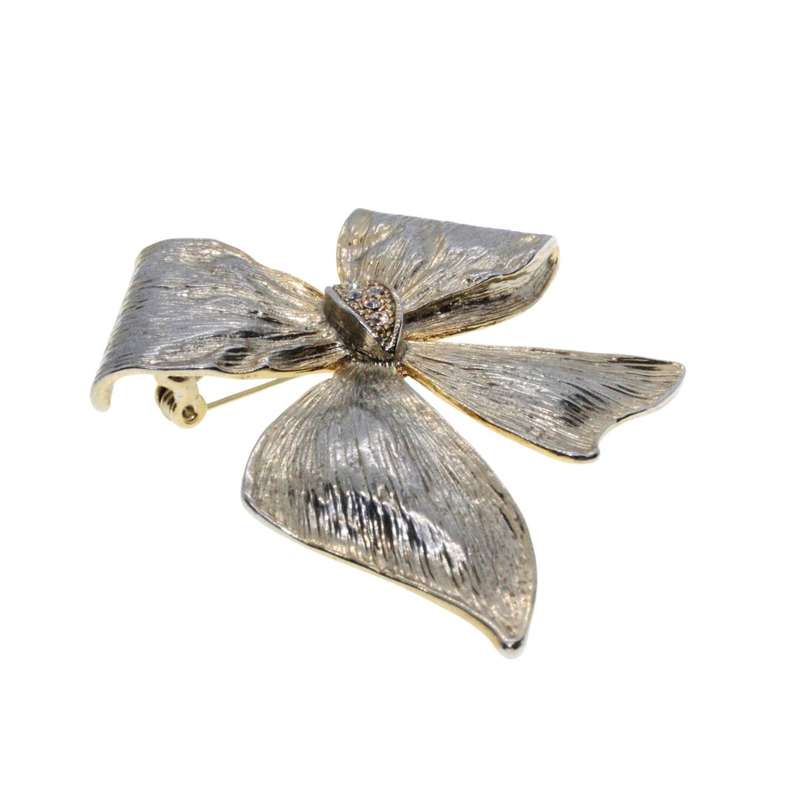 Brooch - Silver & Gold Tone Bow Design. Diamantes in Centre - ML3351