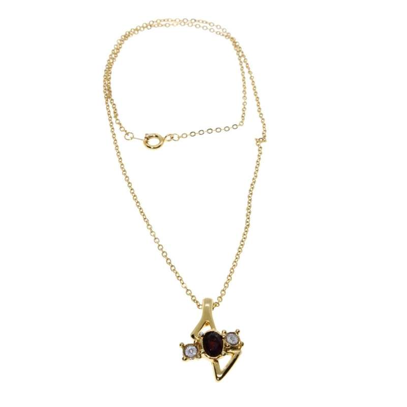 Pendant - Gold Tone Chain. Pendant Centre Red Stone with two Clear Rhinestones - ML3410