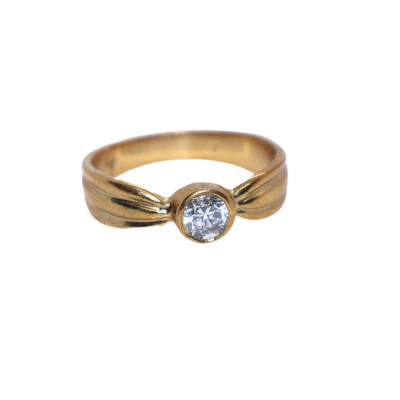 Ring - Silver Gilt . Bow style shape. Clear stone in Cabochon setting - ML3644