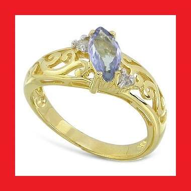 TANZANITE AND DIAMOND 9k YELLOW GOLD RING