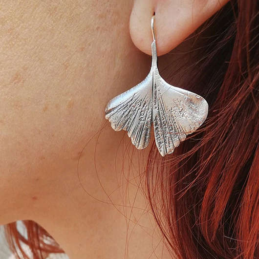 Leaf Asymmetry Silvery White Alloy Earrings