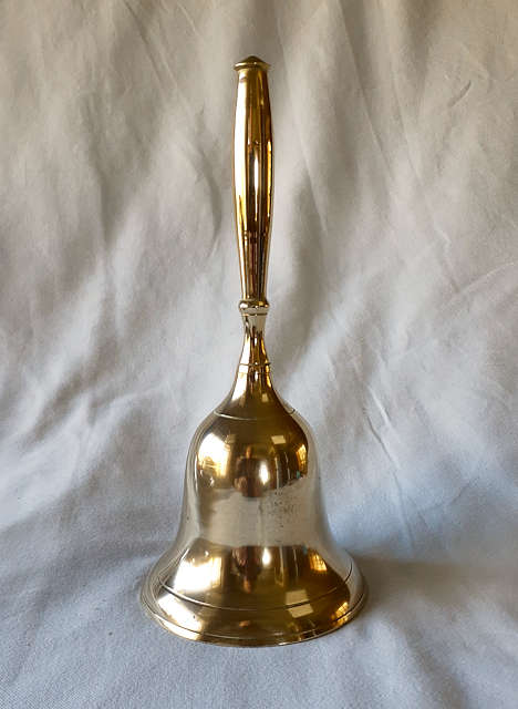 Brass bell with brass handle 22cms tall