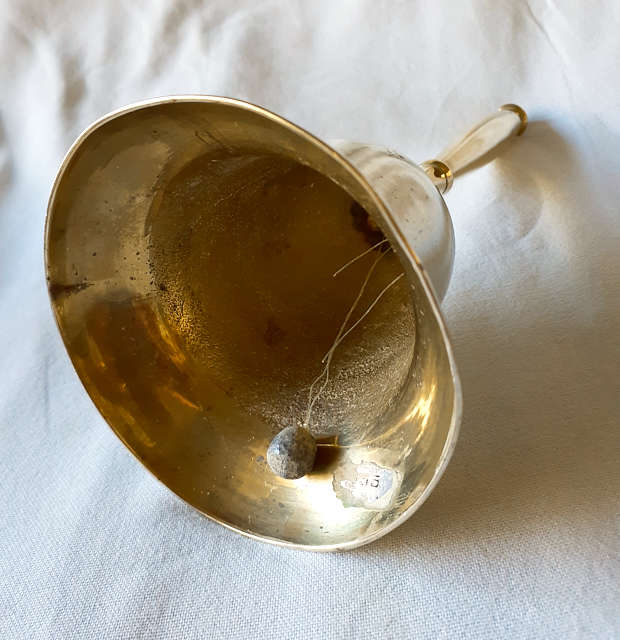 Brass bell with brass handle 22cms tall