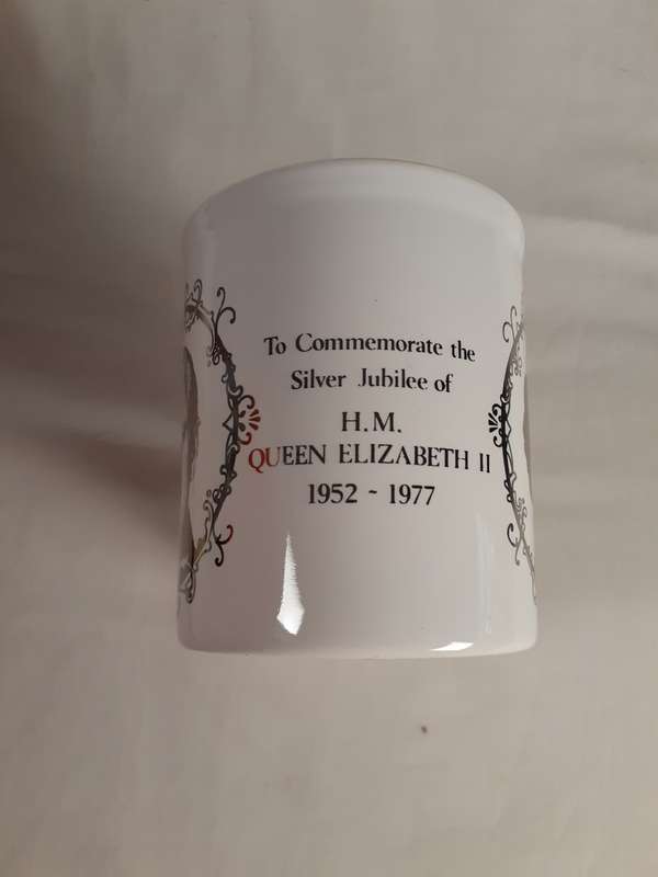 Pair of Queen Elizabeth ceramic silver jubilee mugs 1952 - 1977
