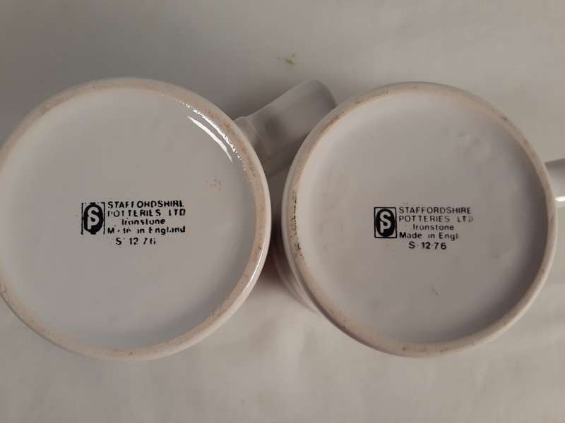 Pair of Queen Elizabeth ceramic silver jubilee mugs 1952 - 1977