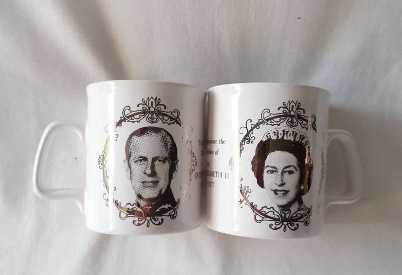 Pair of Queen Elizabeth ceramic silver jubilee mugs 1952 - 1977