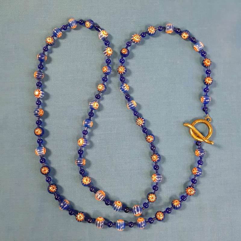 Glass necklace - cobalt blue and pale orange stars - Chevron beads african trade beads