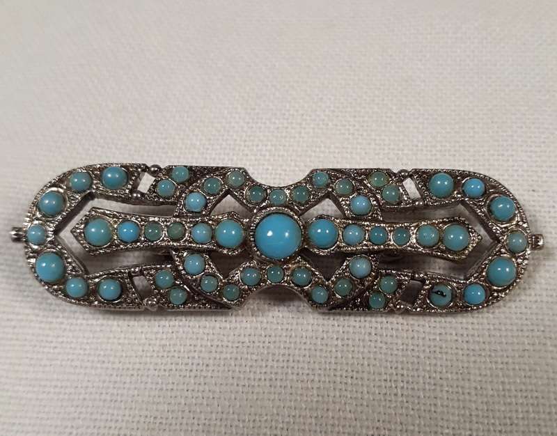 Deco  brooch with blue glass "stones"