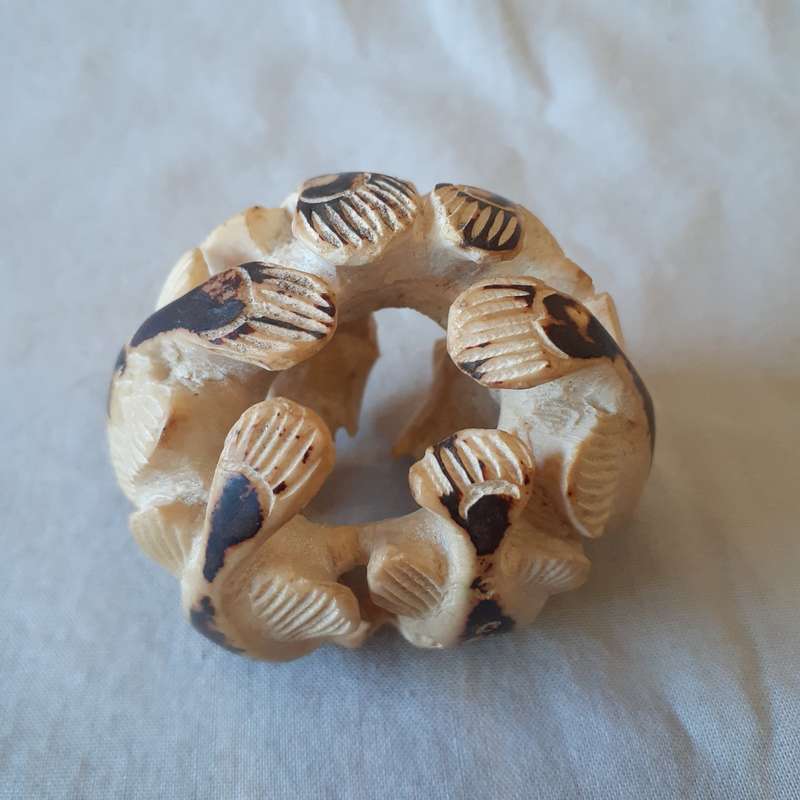Carved Vegetable Ivory fish ball Tagua Nut?