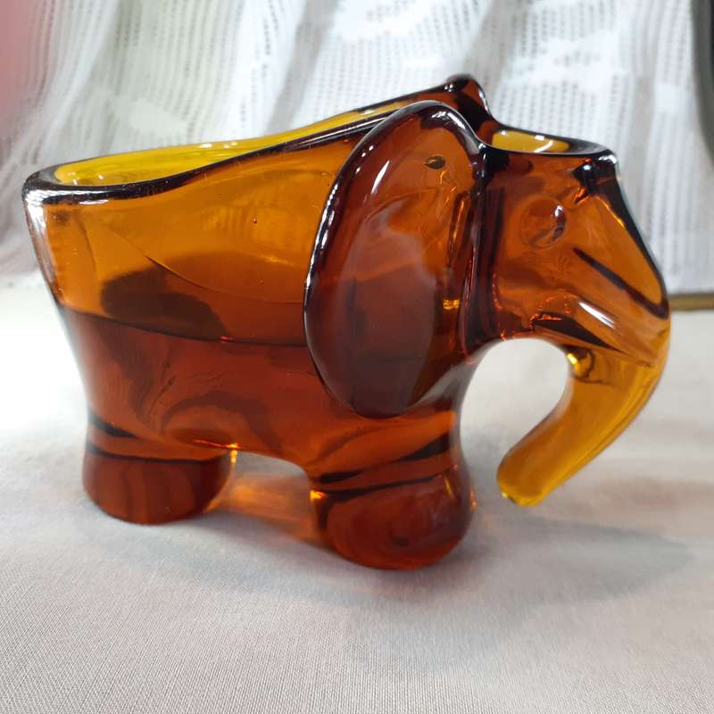 Glass Elephant figurine ashtray - heavy amber glass