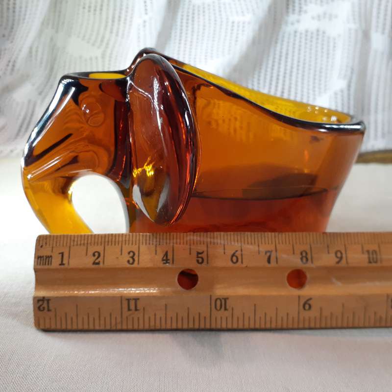 Glass Elephant figurine ashtray - heavy amber glass