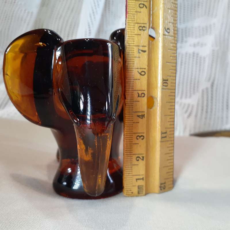 Glass Elephant figurine ashtray - heavy amber glass