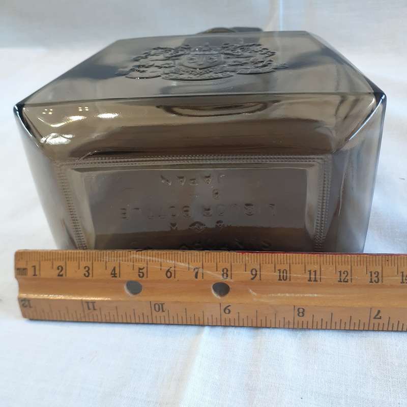 Glass bottle - Vintge Japanese whisky - Suntory Limited Japan  20 cms tall x 12.5 base
