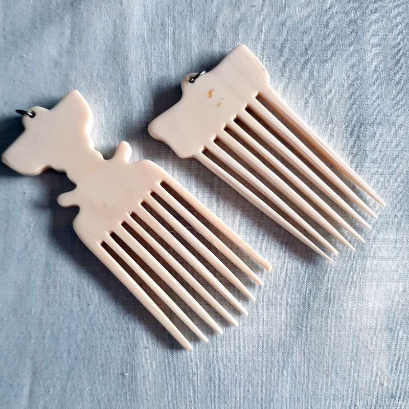 2 pretty Hair combs carved from bone or tooth - finely made