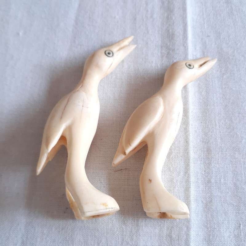 7 little carved bone figurines birds and a crocodile