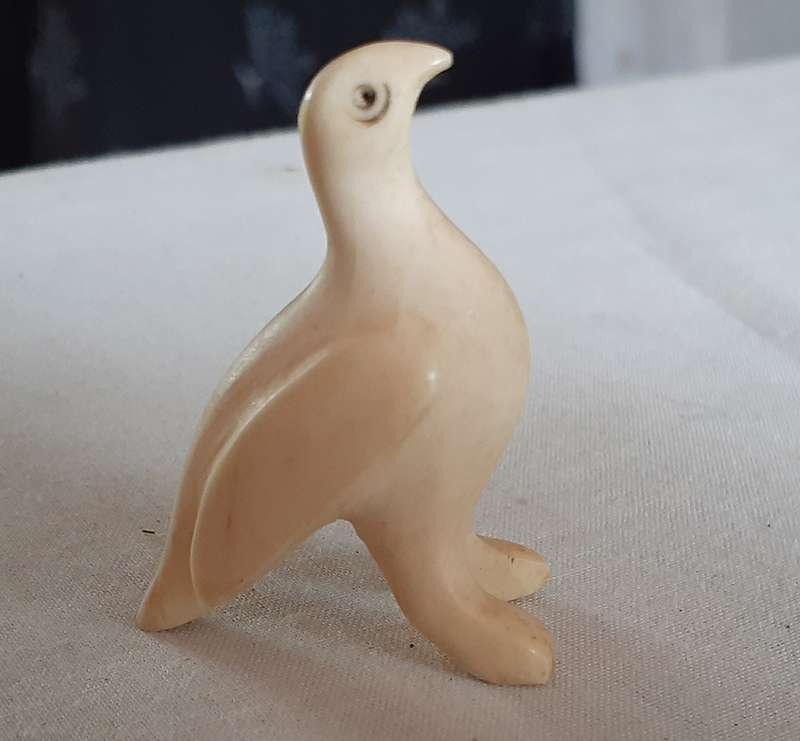 7 little carved bone figurines birds and a crocodile