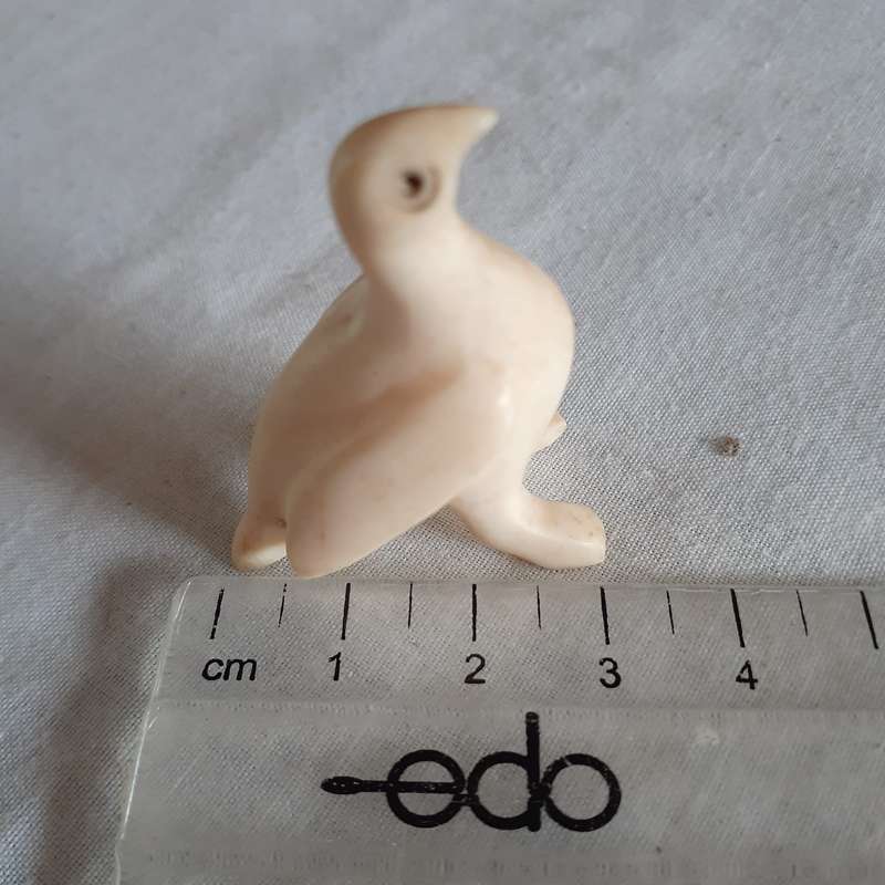 7 little carved bone figurines birds and a crocodile