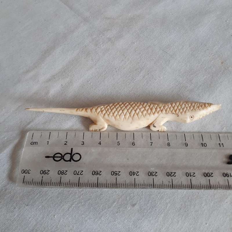 7 little carved bone figurines birds and a crocodile