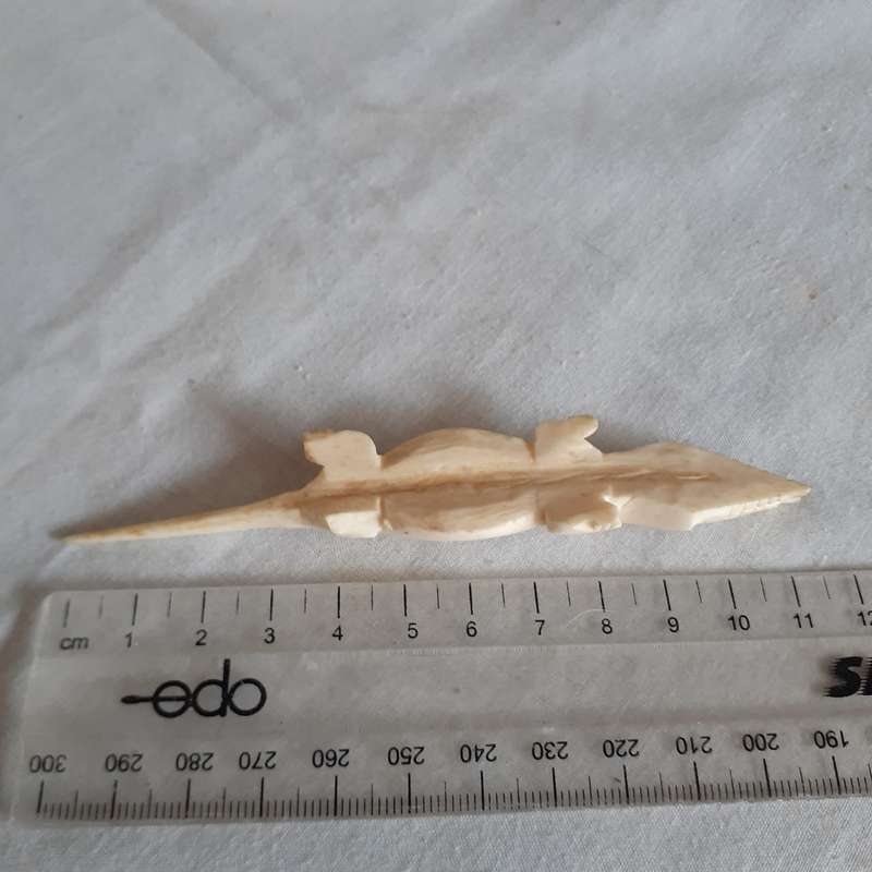 7 little carved bone figurines birds and a crocodile