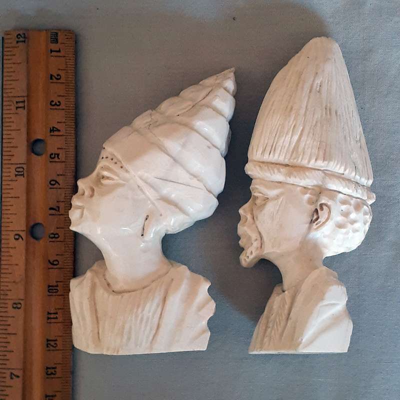 Two carved bone african heads figurines -11cms tall