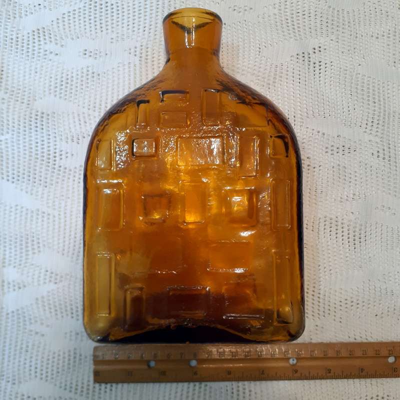 Amber glass bottle with geometric design - Italian   28cms tall x 15 x 6.5