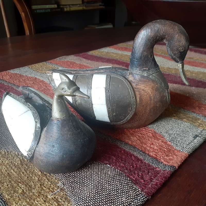 Two carved wooden ducks with bone and brass trim - vintage country decor